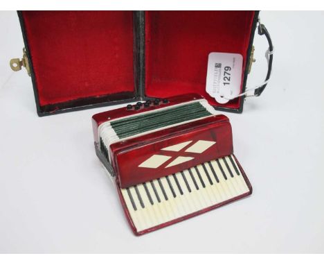 Mini Accordion, circa late XX Century, 9.5 x 9.0cm, in case.
