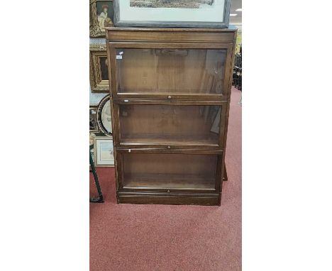 Globe Wernicke Style Sectional Bookcase, with glazed lift up and slide doors to the three book compartments, 86.5cm wide.31cm