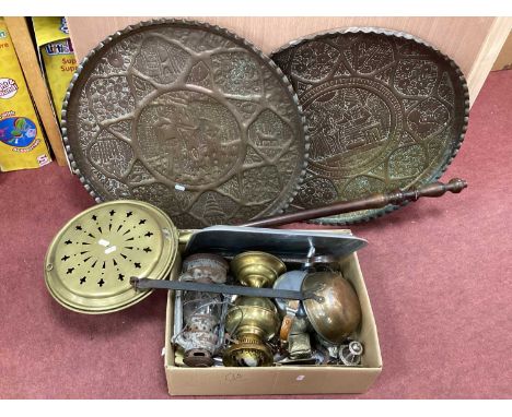 Two Embossed Brass Chargers, (one featuring Adam &amp; Eve), 60cm diameter, tilly lamp, cutlery, warming pan, etc.