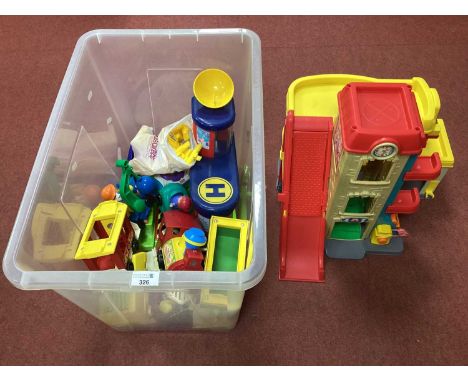 An Assortment of Childrens Toys, including Fisher Price Little People Car Garage play set, Colour Click Crib Camera toy, Circ