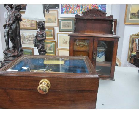 Oak smoker's cabinet, 41.5cm tall with pipe aperture to carved back, two inner drawers, ceramic jar and dishes. Table-top dis
