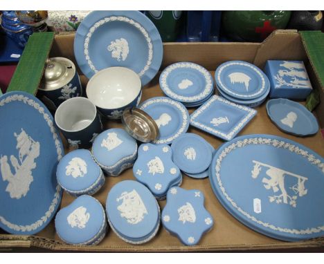 Wedgwood Powder Blue Jasper Ware, twenty-four pieces including Moon Landing plate, oval trinket dish 25cm wide, lidded boxes,