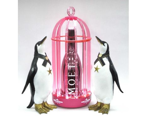 Moet &amp; Chandon Novelty Table Lamp in Pink Birdcage Frame, 60cm high, plus a pair of penguin ornaments (3).