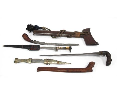 Kris - Indonesian/Malayan, with silvered blade, ornately carved wooden handle, 47cm long in tomahawk style wooden scabbard, p