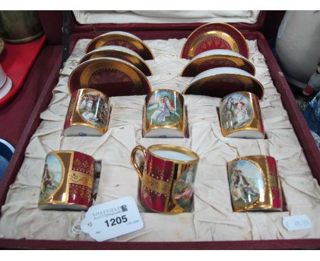 Austrian Cabinet Coffee Set, in maroon and gilt, bearing beehive stamp, the cups featuring Regency courting figures, in (dama