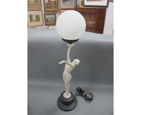 A Mid to Late XX Century Art Deco Style Lamp, of a lady holding up a globular shade, on raised black base, 64cm overall.