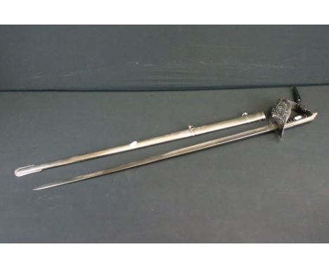 AN 1897 PATTERN INFANTRY OFFICER'S SWORD, the 32 1/4" blade etched with royal shield and Edward VII cypher amid foliage, comp