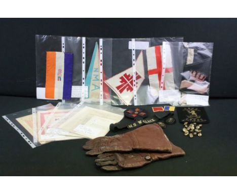 A collection of mixed military collectables to include ephemera, car pennants, patches, buttons, badges, gauntlets...etc.. 