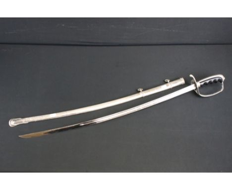 A 20th Century US United States M1902 pattern officer's sword having a ribbed finger grip simple domed pommel with backstrap,