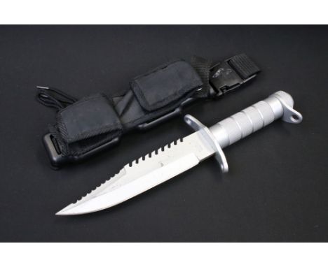 A survival / divers knife by Rostfrei complete with fitted scabbard. 