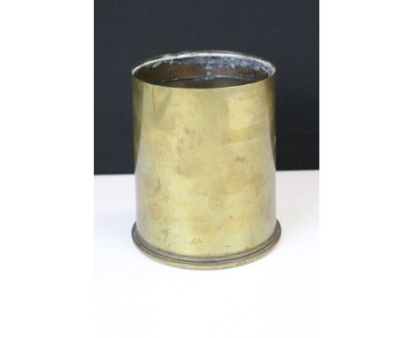 A British World War One trench art vase made from a spent 18Pr brass shell case, dated 1916 and broad arrow stamped. 