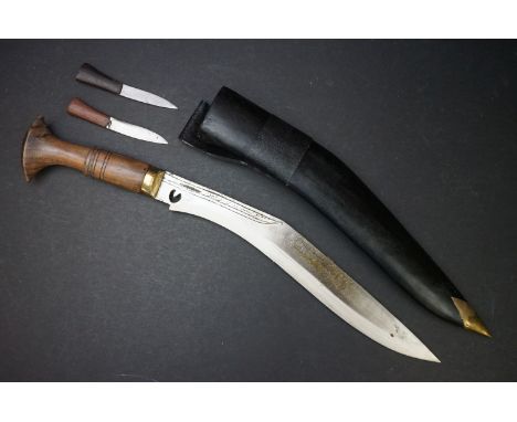 An Indian made Kukuri knife complete with scabbard and tools. 