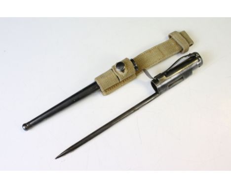 A British World War Two era Sten mk1 and mk2 sub-machine gun bayonet marked P &amp; JSL together with the broad arrow mark. 