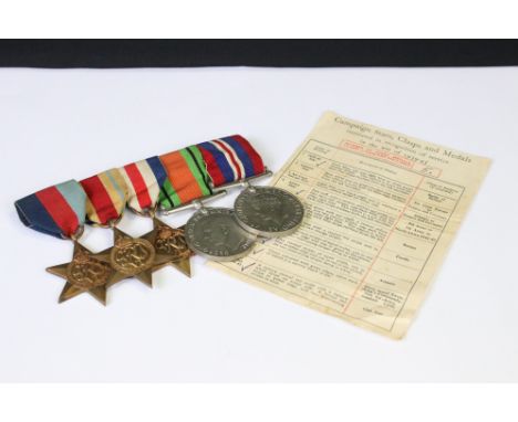 A British World War Two full size medal group of five to include the 1939-45 British war medal, the 1939-45 defence medal, th