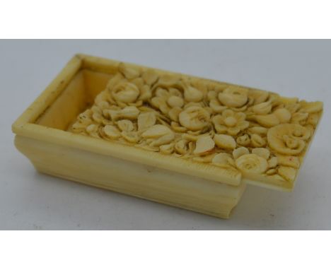 Bone snuff box with carved floral slide lid 