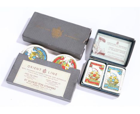 Two packs of Waddington circular playing cards for Orient line cruises, the card backs in blue and red decorated with a saili