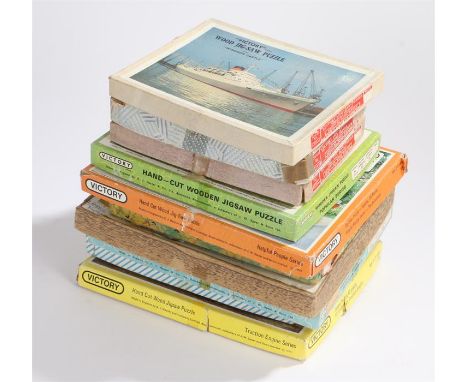 Ten Victory jigsaw puzzles to include traction engine, HMS Victory etc. (10)
