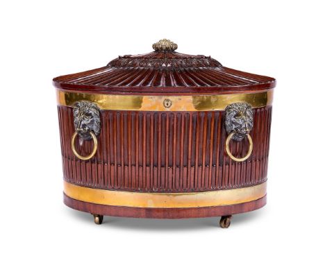 A GEORGE III BRASS-MOUNTED MAHOGANY WINE COOLER ATTRIBUTED TO GILLOWS, CIRCA 1800-10     Of fluted oval form, the hinged cove
