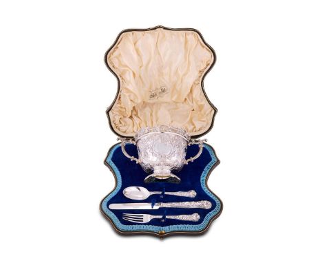 A CASED VICTORIAN CHRISTENING SILVER TWIN HANDLED BOWL, KNIFE, FORK AND SPOON WAKELY & WHEELER, LONDON 1897 The twin handled 