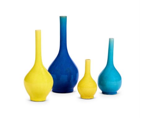 A SET OF FOUR OVOID GLAZED BUD VASES FRENCH, CIRCA 1900   the tallest 16cm high     SALEROOM NOTICE:  The top of the tallest 