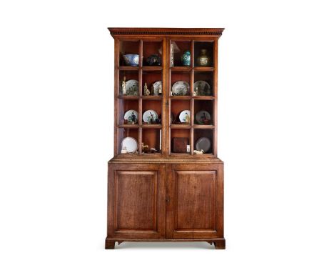 A GEORGE II OAK BOOKCASE                                                                                                 MID-