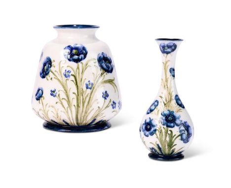 TWO WILLIAM MOORCROFT (1872-1945) FOR JAMES MACINTYRE & CO. 'FLORIAN WARE' BLUE POPPY VASES  CIRCA 1900  Green signature and 