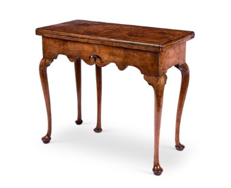 A GEORGE I PROVINCIAL WALNUT AND ASH CARD-TABLE                                                                    CIRCA 1720