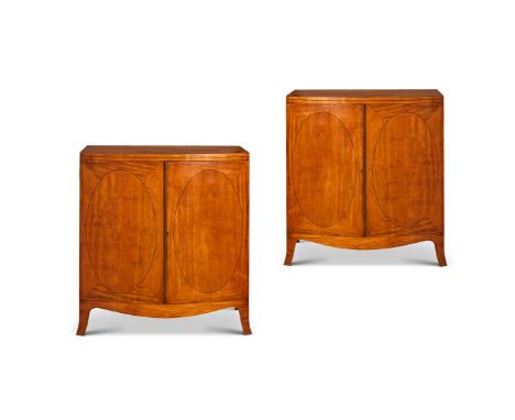 Y &nbspA PAIR OF EDWARDIAN SATINWOOD AND EBONY-LINE INLAID BOWFRONT SIDE CABINETS EARLY 20TH CENTURY    Each with two doors d
