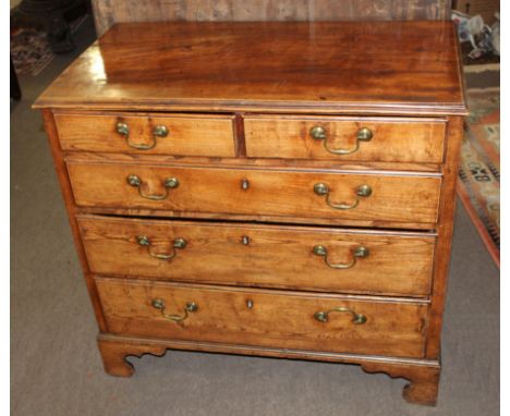 18th century oak chest with moulded edge over two short and three full width graduated drawers on bracket feet, 96cm wide