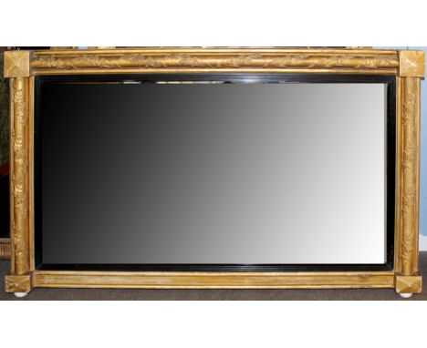 19th century gilt and gesso rectangular overmantel mirror, the Torus moulded surround decorated with berries and foliage, 147