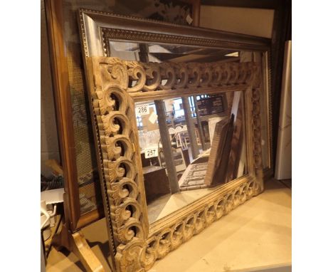 Two wood framed mirrors and tapestry fire screen 