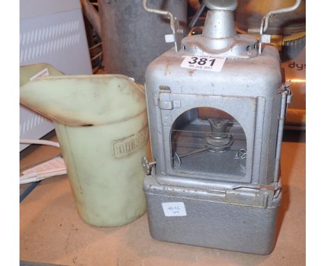 Duckhams oil jug and a vintage railway lantern 