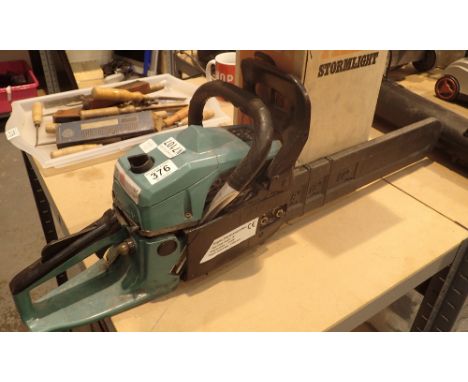 Petrol chainsaw and Tilley lamp
