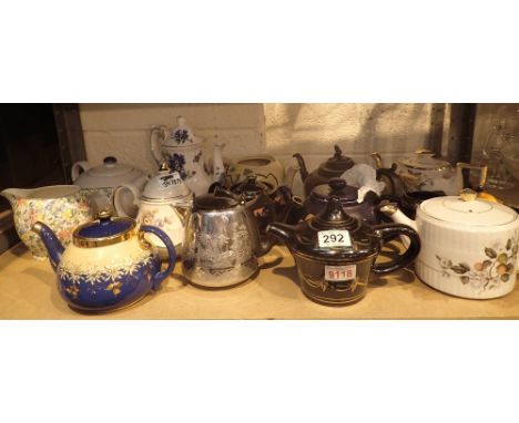 Shelf of assorted teapots 