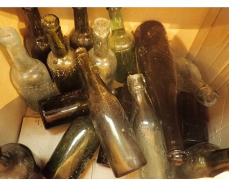 Shelf of antique glass bottles