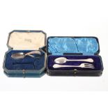 An Edwardian cased silver Christening fork and spoon, with Trefid ends, Sheffield 1904; and a silver