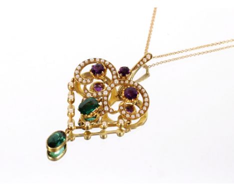 A 15ct gold Art Nouveau pendant,&nbsp;set amethyst, seed pearls and emeralds, hung to a fine link chain, total weight 8.5gms&