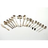 A collection of various silver fancy spoons, condiment spoons, tea spoons, butter knife etc. total