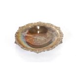 A mid-20th Century silver pedestal dish, by Adie Bros., having foliate shaped border and central