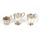 A small silver Christening mug, Birmingham 1930; another similar, Birmingham 1951; and a small