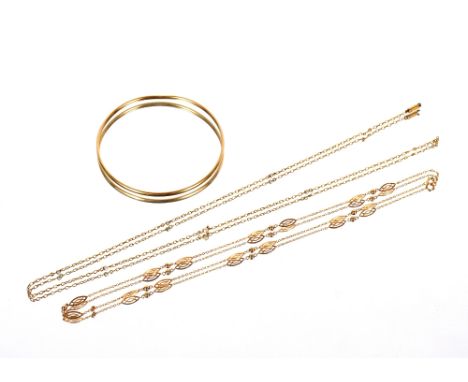 A yellow metal necklace,&nbsp;marks rubbed; a 9ct gold bangle 5.5gms and a yellow metal and seed pearl necklace AF, 2.5gms
