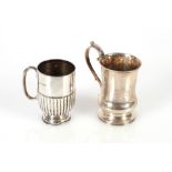 A small silver Edwardian Christening mug, having half fluted body decoration, Sheffield 1906; and