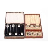 A cased set of silver seal end coffee spoons, Birmingham 1924; and a cased set of six bean end