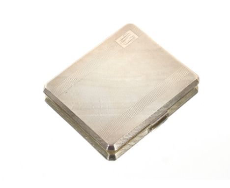 A pair of Georgian silver bright cut decorated sugar tongs;&nbsp;and an Art Deco design silver engine turned cigarette case. 