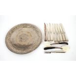 An Eastern white metal tray, the border with animal decoration; a pair of mother of pearl and