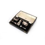 A cased silver three piece cruet, by Adie Bros., Birmingham 1958, having odd silver and plated