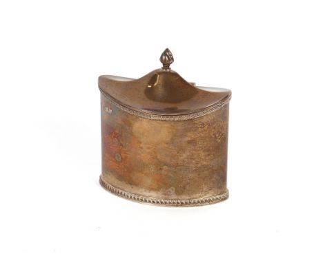 An Edwardian silver tea caddy,&nbsp;of elliptical shape, the hinged lid surmounted by a flamb&eacute; finial, gadroon border 