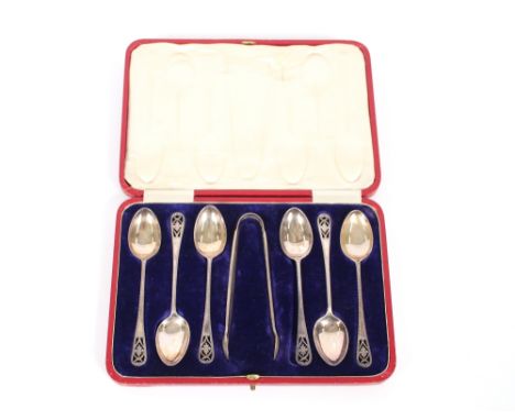A cased set of six silver teaspoons, with pierced terminal decoration Sheffield 1951,&nbsp;89.29gms; and a cased set of six s