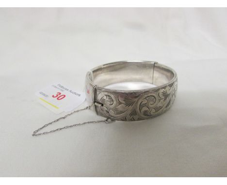 GEORG JENSEN  SILVER HALF-ENGRAVED BANGLE WITH SAFETY CHAIN, MARKS FOR LONDON, 1963 AND MAKER'S STAMP, 1.3 OZT