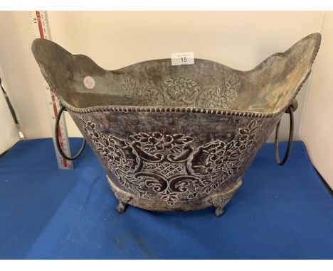 A TWO HANDLED METAL PLANTER 